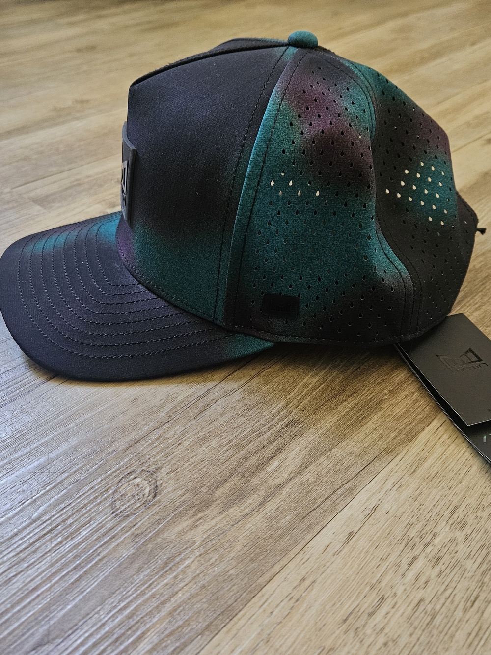 NWT Melin Men's Hydro Odyssey Stacked Aura NOAR CL Black Performamce Hat - Picture 2 of 8